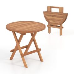 two wooden folding chairs and a small round table on an isolated white background with clippings