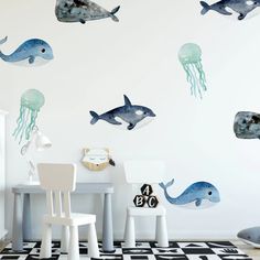 an ocean themed room with blue whale and jellyfish wall decals