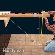 a man sitting on the ground with a measuring tape in front of him and his measurements