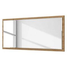 a wooden framed mirror hanging on the wall next to a whiteboard with a window