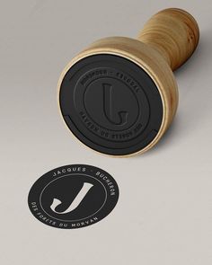 a rubber stamp with the letter j on it