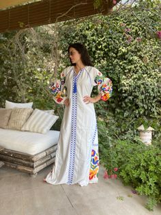 "This bohemian multicolour embroidery dress is a an eye catcher! It is an extremely comfortable wear, light and soft and can be used on many occasions - home gatherings, festival parties, summer occasions, dinners, or just in your home to feel comfortable. Fabric : 70% Egyptian Cotton; 30% Polyester. Kaftan measurements in inches : Medium (Size 8/10 USA) Bust : 39-40 Hip : 45-46 Large (Size 12/14 USA) Bust : 44-45 Hip : 50-51 XL (Size 16/18 USA) Bust : 47-48 Hip : 53-54 XXL (Size 20/22 USA) Bust Egyptian Clothes, Cotton Kaftan Dress, Egyptian Heritage, Summer Kaftan, Egyptian Clothing, Embroidered Caftan, Casual Beach Dress, Embroidered Kaftan, Hills Wedding