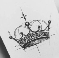 a drawing of a crown on top of a piece of paper