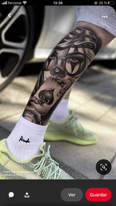 a man's leg with a tattoo on it and an image of a bear