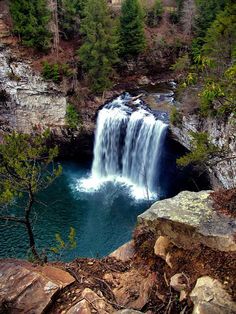 a waterfall with water coming out of it