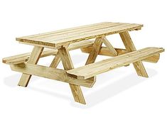 a wooden picnic table sitting on top of a white floor