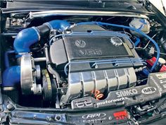 the engine compartment of a vw golf