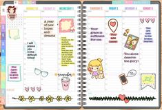 an open planner book with stickers on it