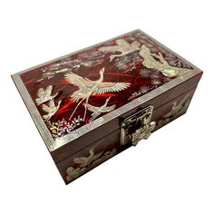 an ornate wooden box with birds painted on it