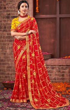 This Saree is Ready to Wear (With Fall and Pico Done). A designer saree in Red & Yellow color. It has intricate design all over the saree. This saree is a suitable amalgamation of style and grace that is required from an ethnic wear. The saree is ideal for any formal gathering. The saree comes with an unstitched blouse of corresponding color and design as shown in the picture. Georgette Designer Red & Yellow Color Saree Fabric Type: GeorgettePrimary Color: RedSecondary Color(s): - YellowSaree Le Red Unstitched Pre-draped Saree For Diwali, Festive Red Pre-draped Saree With Pallu, Fitted Bandhani Print Saree For Puja, Bollywood Style Red Pre-draped Saree With Self Design, Red Cutdana Pre-draped Saree For Navratri, Red Bandhani Print Pre-draped Saree In Art Silk, Anarkali Pre-draped Red Saree For Navratri, Red Bandhani Print Art Silk Pre-draped Saree, Red Pre-draped Saree With Unstitched Blouse For Diwali