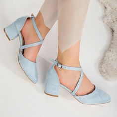 BABY BLUE BRIDE SHOES - BLUE WEDDING BLOCK HEELS - BABY BLUE SUEDE SHOES Welcome to Belle Wedding Shoes, your source for stunning baby blue low heels that effortlessly combine style and comfort.  Meticulously handcrafted with premium baby blue suede vegan leather, these bridal shoes feature a secure criss cross strap on the upper part and a closed-toe design, ensuring your feet stay comfortable all day. The timeless, sleek design effortlessly complements your wedding attire, and the 2.1-inch (approximately 5 cm) block heels provide the perfect elevation, enhancing both your confidence and stature. Whether you seek something blue or baby blue block heels, blue bridal shoes, elegant wedding heels, or blue bridal heels, our blue bridal shoes promise to improve your look and make you feel radi Blue Bride Shoes, Art Deco Wedding Shoes, Light Blue High Heels, Wedding Block Heels, Blue Bridal Heels, Classic Wedding Shoes, Blue Heels Wedding, Blue Low Heels, Blue Block Heels