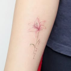 a small pink flower on the arm