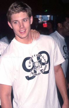 two young men standing next to each other