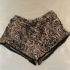 Casual Tiger Print Shorts - Tiger Print Multi Color - Brand Is International (Used Forever 21 For Publicity) - Black Detailing - Small Size 6/8 Fits A Medium And Possibly Large - Perfect Condition - Never Worn - Bought When I Lived In Brazil! - Most Reasonable Offers Accepted :) - Willing To Negotiate Tiger Print Shorts, Tiger Print Clothes, Casual Brown Shorts For Night Out, Forever 21 Bottoms With Elastic Waistband, Short Length, Vacation Bottoms With Built-in Shorts By Forever 21, Forever 21 Bottoms With Built-in Shorts For Vacation, Forever 21 Short Bottoms For Loungewear, Forever 21 Stretch Bottoms With Built-in Shorts, Forever 21 Shorts For Loungewear