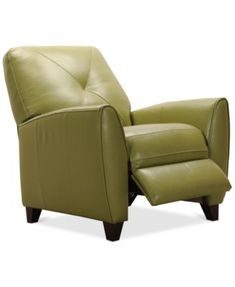 a green leather recliner chair and footstool in front of a white background