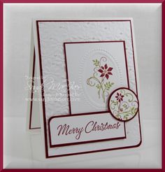 a christmas card with flowers on it