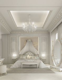 an elegant bedroom with white furniture and chandelier