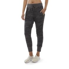 PRICES MAY VARY. Recycled polyester/modal/spandex light brushed fleece Slash Pockets Comfort Elastic Waistband 2x2 Rib at Waistband and Cuff Sustainable Fabric with 4 Way Stretch Printed Jogger Pants, Soft Joggers, Womens Camo, Sustainable Fabric, Printed Joggers, Ankle Leggings, Black Camo, Womens Tights, Fleece Joggers