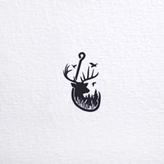 a deer head with an umbrella in it's mouth on a white paper background