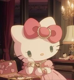 a hello kitty sitting on top of a bed next to an open suitcase and lamp