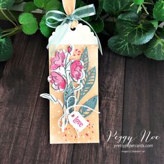 a tag with some flowers on it