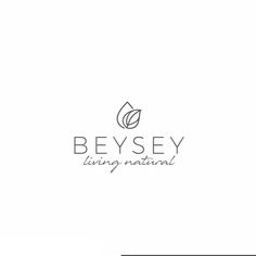 the logo for beysey living natural, which is designed to look like a leaf