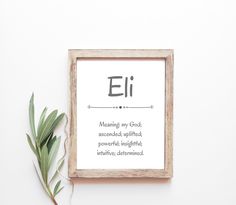 a wooden frame with a plant next to it that says, eii meaning my god