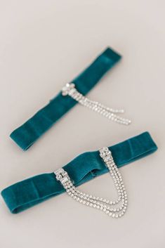 "All the single gentlemen! It's time for the garter toss! Our new bespoke crystal embellished, velvet ribbon garter shies away from the 1980s frilly lace with old elastic and revives this once-antiquated wedding moment into a modern day photo op. Say \"cheese!\" with this stylish reinvention of the garter. Exclusively from Veiled Beauty. Garter Style #1736 - Deep forest green velvet elastic stretch ribbon - Marquise rhinestone crystal accents and chain - Sold as a set - one to toss and one to ke Crystal Garter, Vintage Garter, Rhinestone Garter, Rose Gold Hair Vine, Garters, Garter Toss, Gold Hair Vine, Drop Veil, Stretch Band