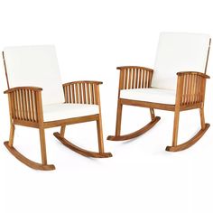 two wooden rocking chairs sitting next to each other