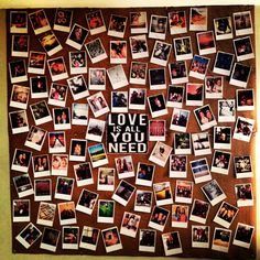 a bulletin board covered in pictures and words that read, love is all you need