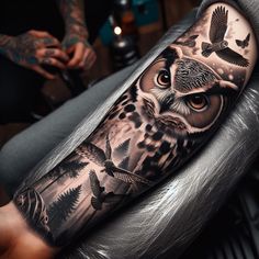 an owl and birds tattoo on the arm