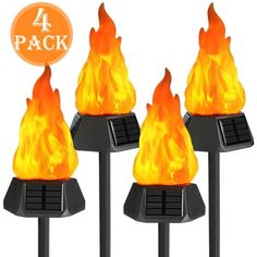 four solar powered fire pits with 4 packs on each side and the same amount of flame