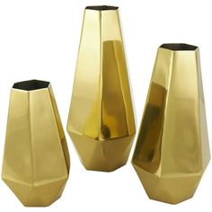 three gold vases sitting next to each other