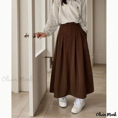 Olivia Mark - Coffee-colored Midi Skirt with High Waist, Pleats and Flared Hem Casual Brown Solid Color Skirt, Casual Brown A-line Skirt, Fall Cotton Skirt In Solid Color, Brown Solid Color Long Skirt, Cotton Pleated Skirt For Workwear In Fall, Casual A-line Pleated Skirt For Work, Casual A-line Pleated Skirt For Winter, Brown Cotton Skirt For Winter, Fall Cotton Pleated Skirt For Work