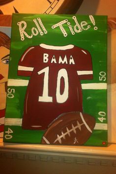 a painting of a football jersey with the words roll tide on it