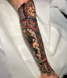 a person with a tattoo on their arm