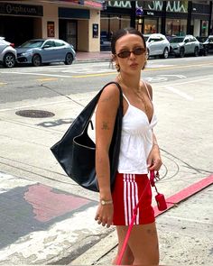 Glastonbury Street Style, 90s Summer Street Style, Summer In The City Outfits Street Style, Hot Weather Streetwear, Summer New York Style, Summer 2034 Outfits, Windbreaker Shorts Outfit, 90s Night Out Outfit, Barcelona Outfits Aesthetic