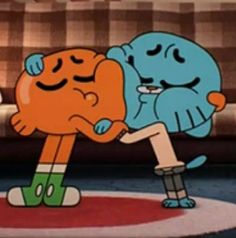 two cartoon characters are hugging each other on the floor in front of a couch and rug