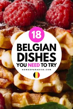 waffles with raspberries on top and the words belgium dishes you need to try