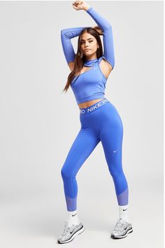 Stay Sleek At The Gym In This Women's Training Pro Crop Top From Nike. In A Blue Joy Colourway, This Slim-Fit Top Is Cut From Smooth, Stretchy Polyester For Lasting Comfort. It Features A Sheer Shrug Design For Added Coverage With An Airy Feel, And A One-Shoulder Strap Design. It Has An Elasticated Underband For Added Support, And Is Finished With Signature Nike Branding At The Chest. Machine Washable.. Material: 81% Polyester/19% Elastane Shrug Design, Football Training Kit, Sheer Shrug, Girls Sports Bras, Fitness Photography, Nike Training, Nikes Girl, Slim Fit Top