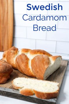 a loaf of swedish cardamoon bread on a cutting board with the text overlay