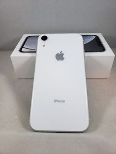 an iphone is sitting in its box on the table