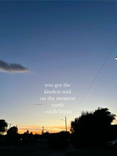 a person flying a kite in the sky with a quote on it that reads, you got the kindest soul on the nearest earth