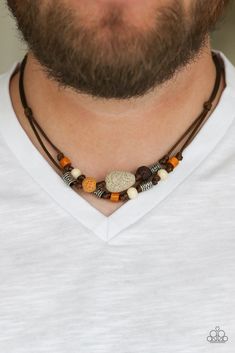 A collection of colorful wooden beads, silver accents, and earthy lava stones are knotted in place along two shiny brown cords for an urban look. Features a button loop closure. Sold as one individual necklace. Manish Style, Collar Hippie, Collar Macrame, Southern Charms, Moda Hippie, Lanyard Necklace, Yellow Necklace, Paparazzi Accessories, Urban Looks