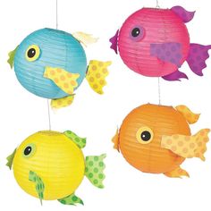 three colorful paper fish hanging from strings