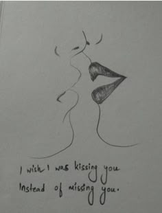 a drawing of a kissing couple with the words, i wish was kissing you instead of missing you