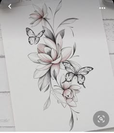 a drawing of flowers and butterflies on paper with watercolor pencils next to it