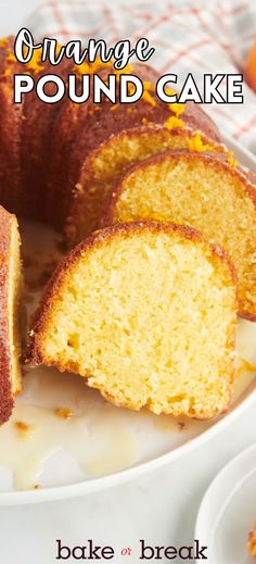 an orange pound cake on a white plate