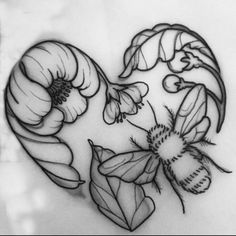 a heart shaped tattoo with flowers and a bee on the inside, in black and white