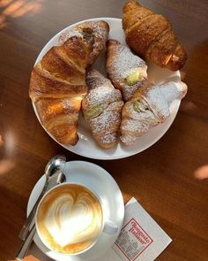 croissants and coffee on a white plate